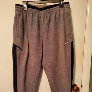 Nike dri fit pants two different sizes one large and one XL